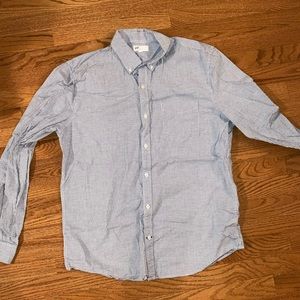 Men’s light worn blue and white grid. Size L.